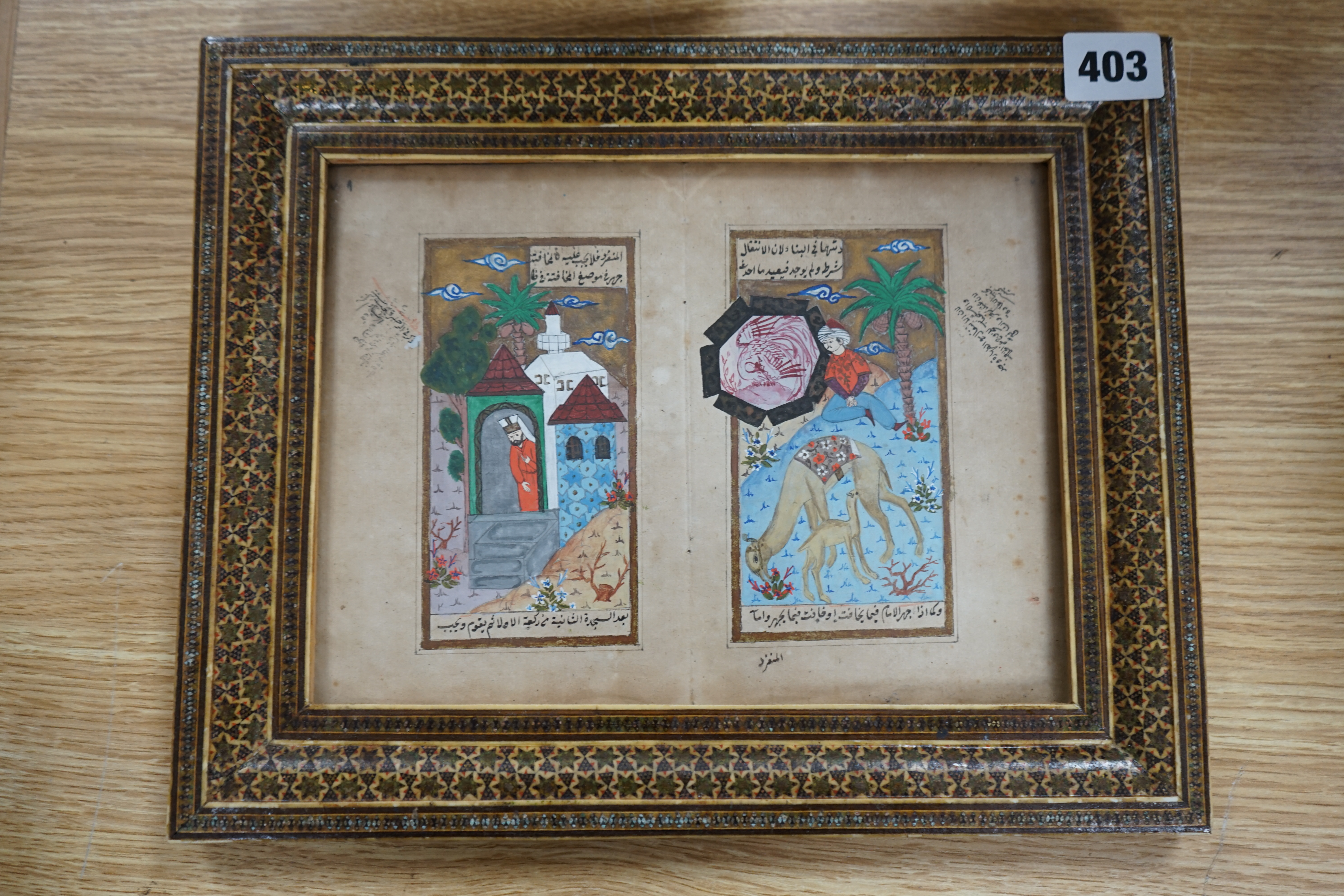 19th century, Persian School, miniature printed book pages, figures and camels, housed in a Vizagapatam frame, 17 x 23cm. Condition - fair